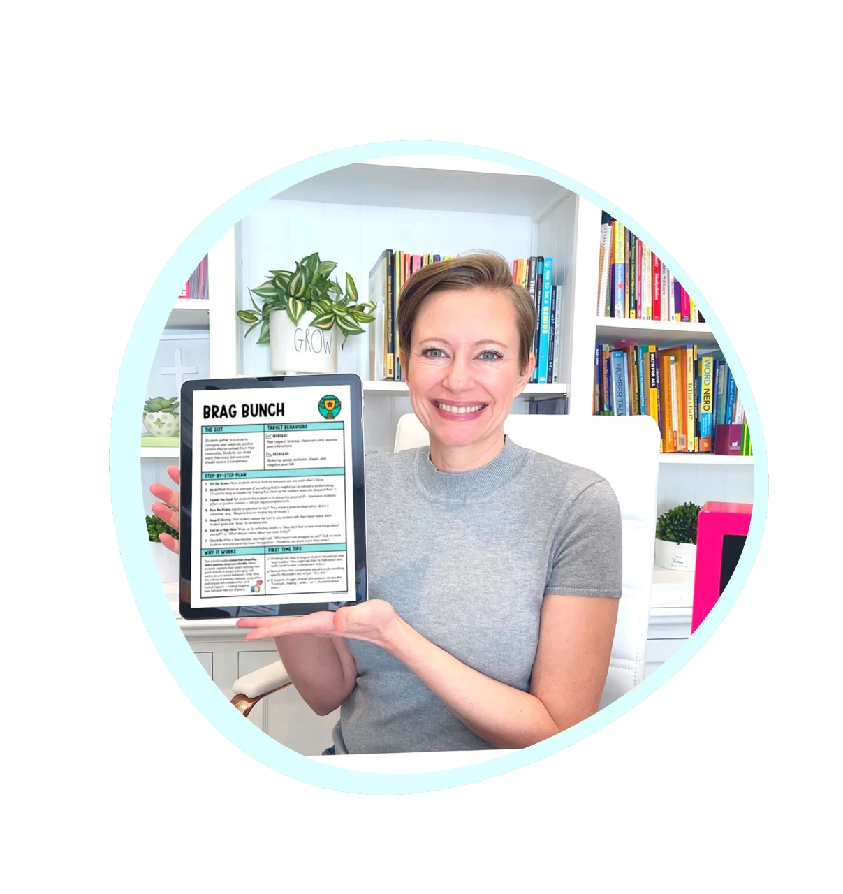 Creator of 5-Minute Magic holding a classroom activity on a tablet, representing classroom-tested behavior-building practices for elementary teachers.